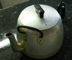 Teapot with angled handle