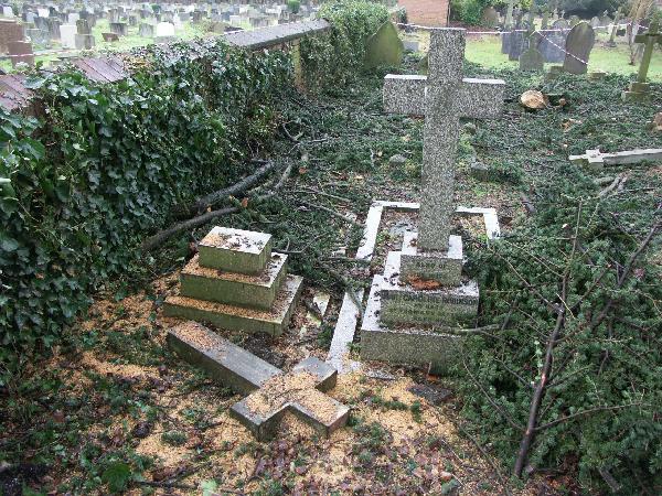 Broken cross on grave